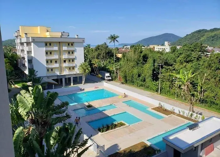 Varanda Gourmet, Ar Condicionado, Elevador 05 Piscinas no Condomínio Passaredo Ubatuba